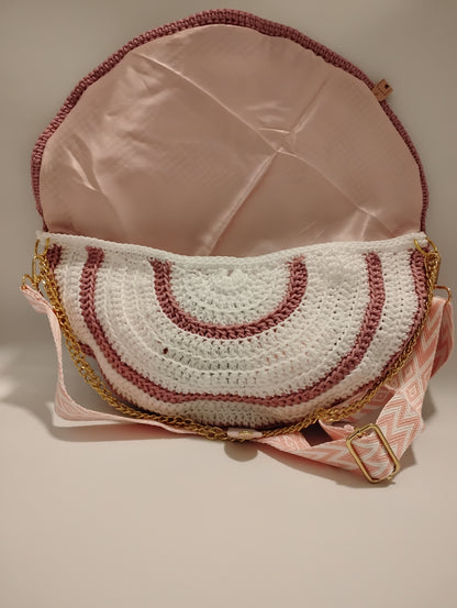 Mid Moon crossbody bag two-tone showing unique crochet design and attractive interior.