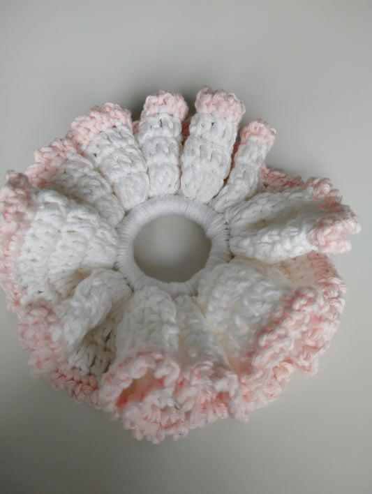 Colorful eye-catching scrunchies crochet in white and pastel pink, lightweight and stylish for hair accessories.