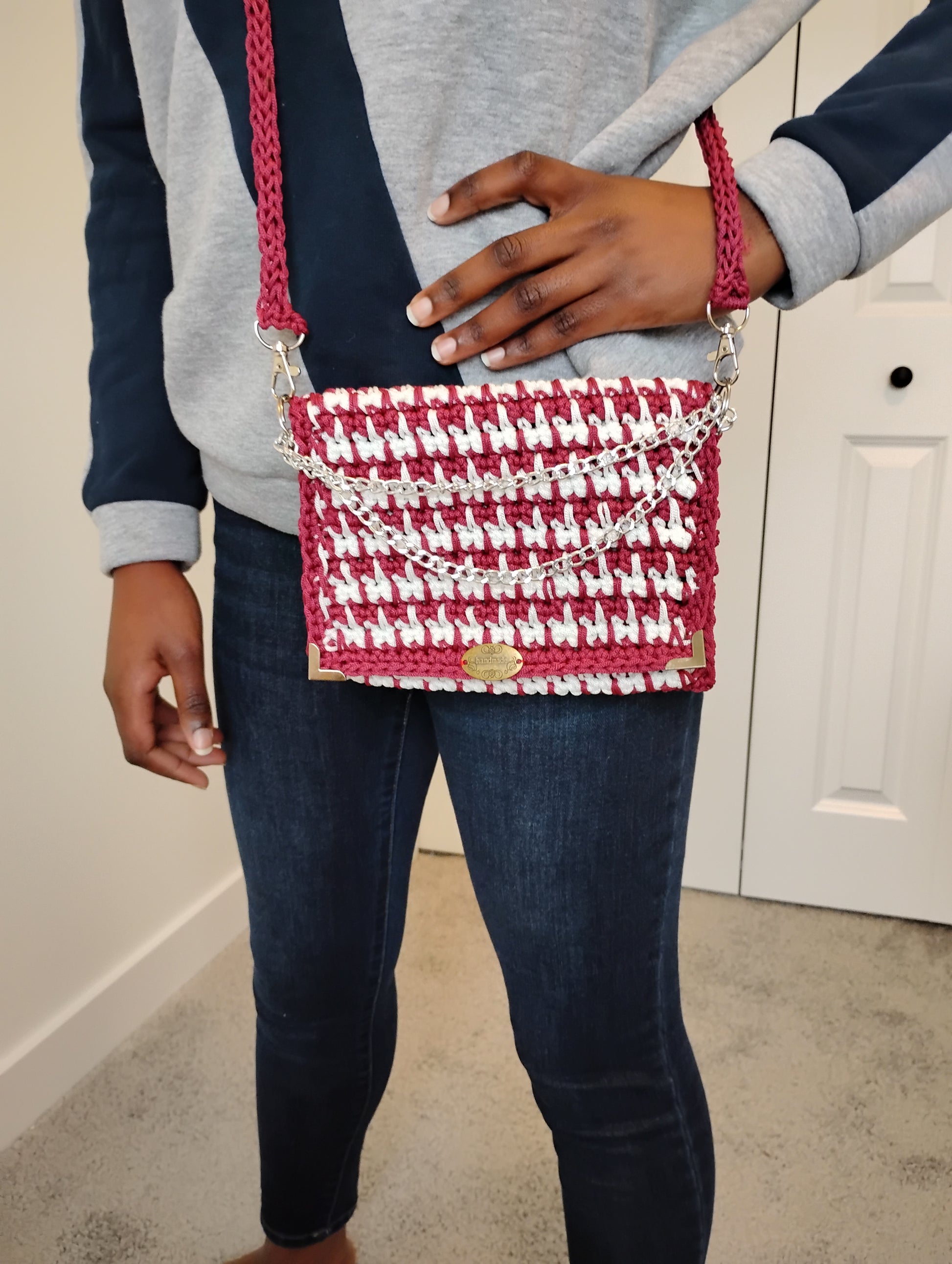 Vintage Old Style Pochette Bag worn by a model, demonstrating its cozy lightweight design and crochet details.
