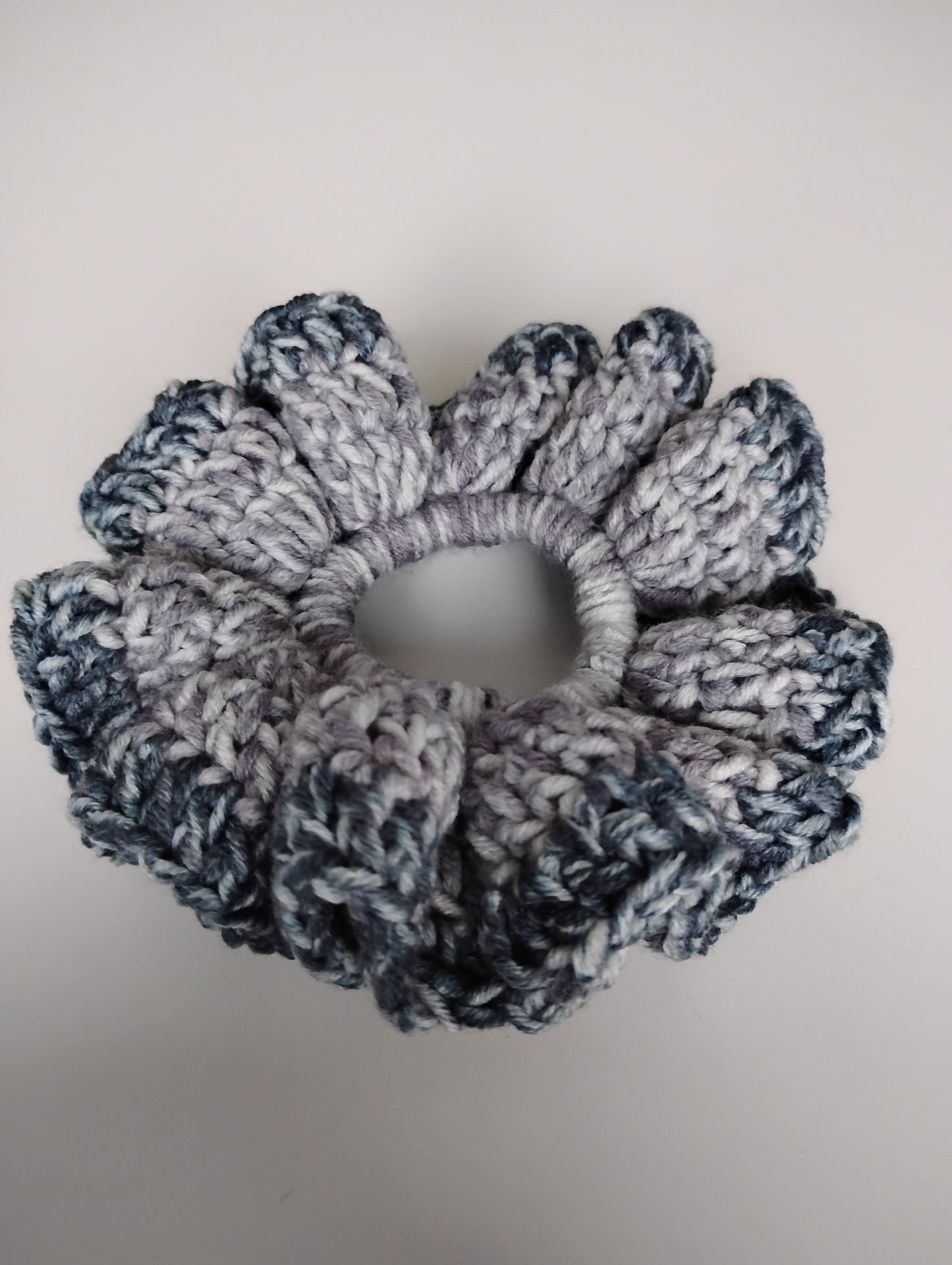 Colorful eye-catching scrunchies crochet in two-tone design, lightweight and stylish accessory for hair.