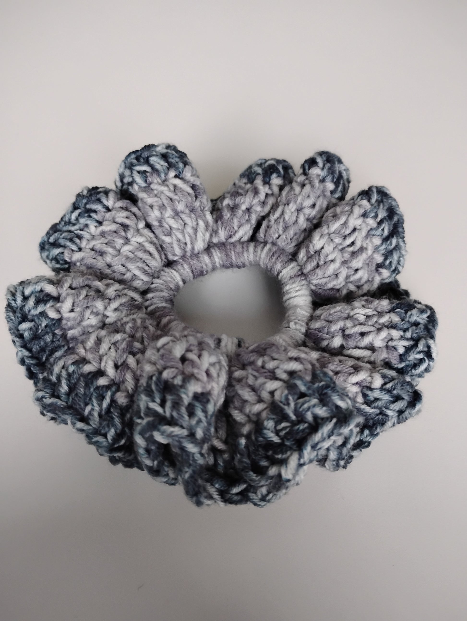 Colorful eye-catching scrunchies crochet in two-tone design, lightweight and stylish accessory for hair.