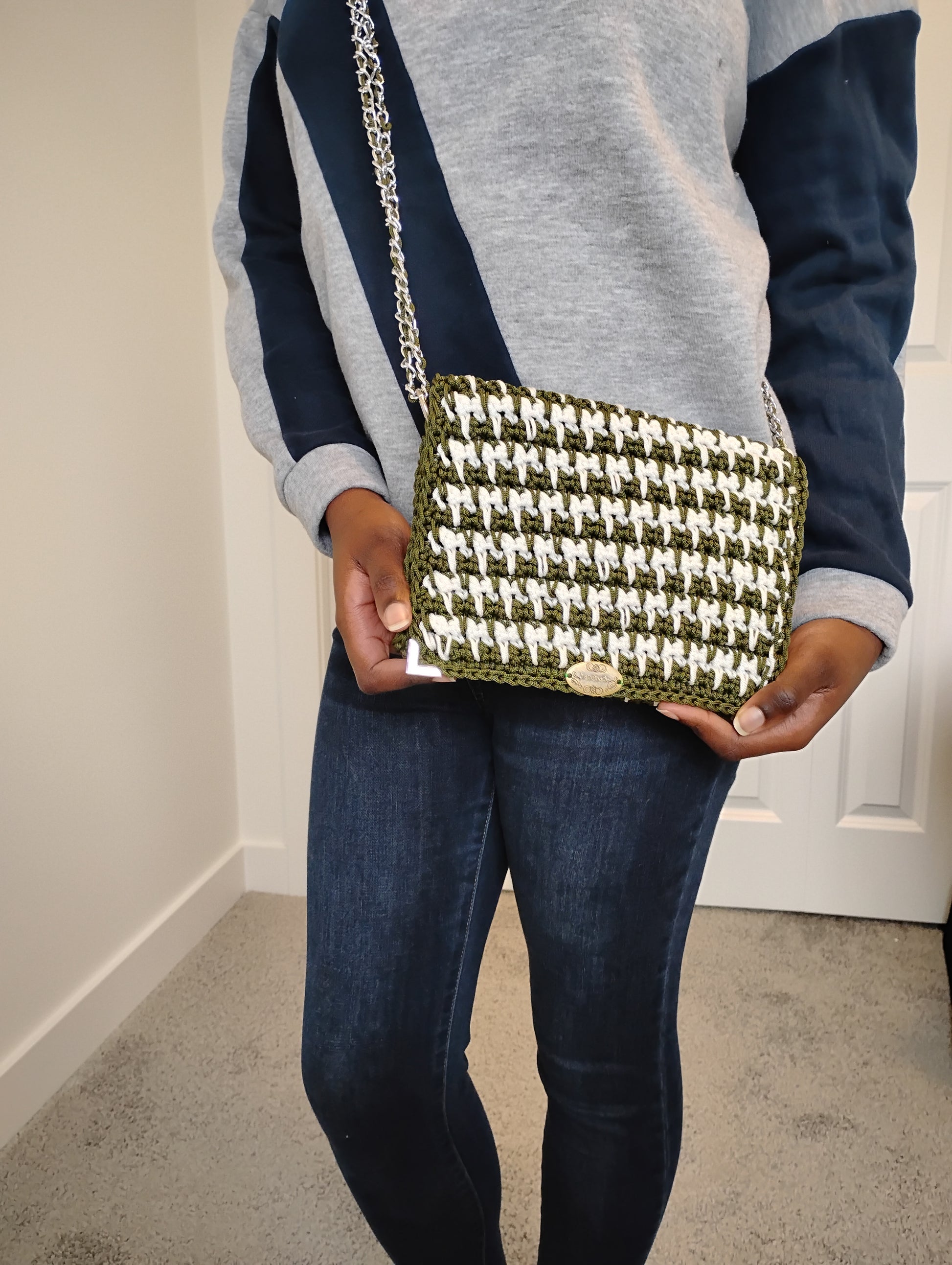 Vintage Old Style Pochette Bag worn by a person in casual clothing, showcasing its cozy lightweight design.